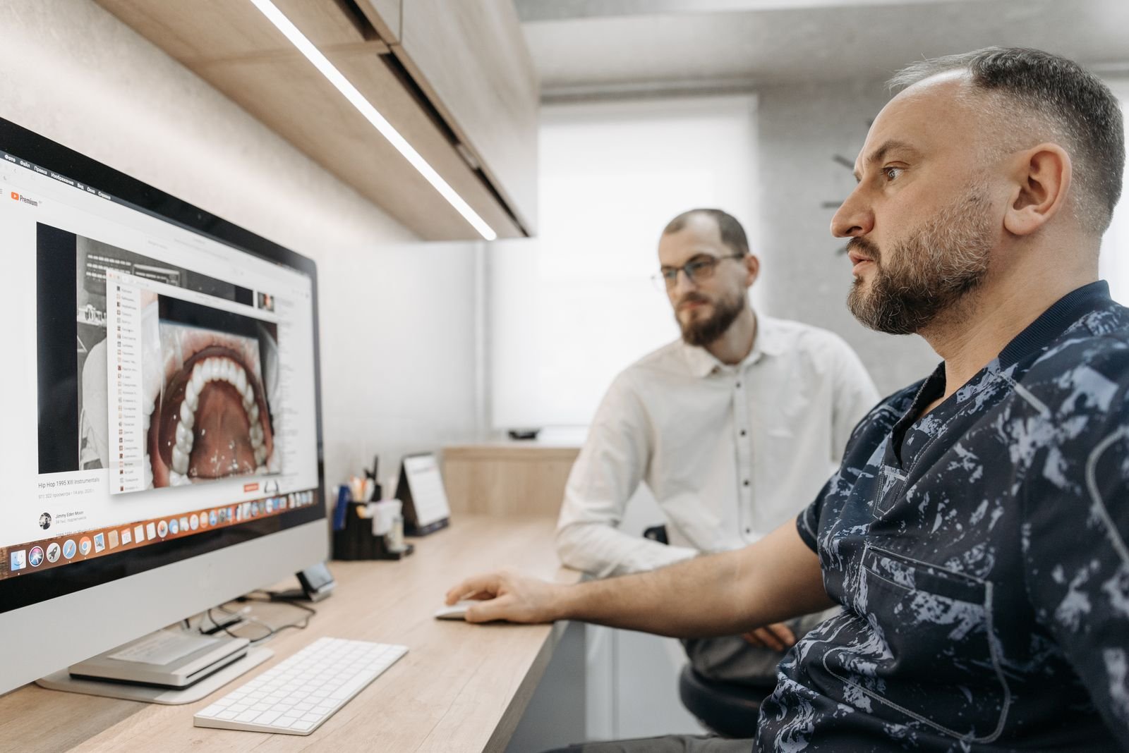 Doctors reviewing digital scan