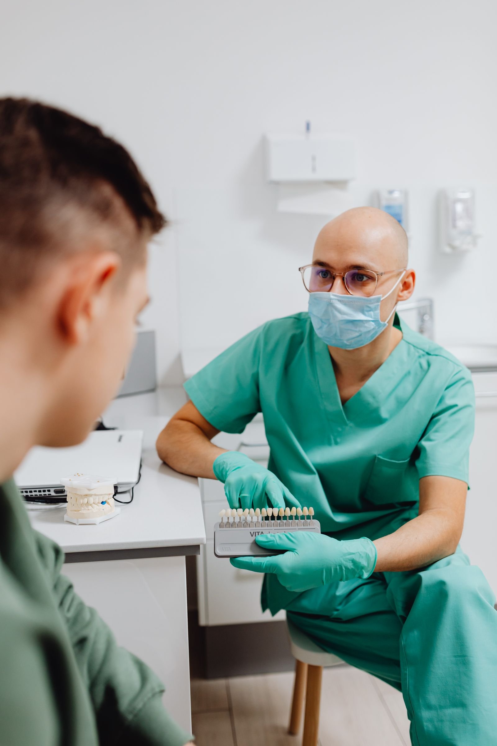 Dentist matching tooth shade